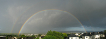 27068-27072 Double raindbow over houses.jpg